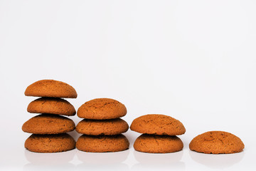 Fototapeta na wymiar Oatmeal cookies on a white background.