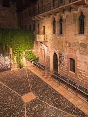 The famous balcony of Romeo and Juliet at night in Verona, Italy