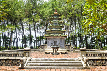 Fototapeta premium tower and censer inside the pagoda Thien Mu in the city of Hue, Vietnam.