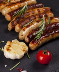 Wiener Sausages on black background.