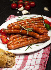 Wiener Sausages on white plate.