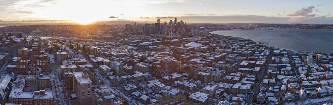 Seattle Morning Sunrise Aerial View Above City Skyline Lake Union to Elliott Bay Winter Snow Covered Buildings