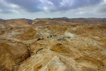 Fototapeta na wymiar Kind from the mountain of masada to the desert of Israel