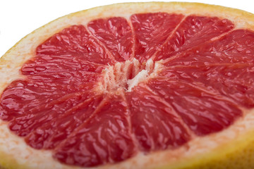 Fototapeta na wymiar Juicy red grapefruit isolation 