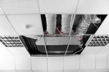 Industrial air conditioner mounted on ceiling indoors