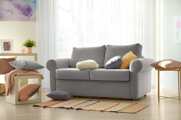 Living room interior with comfortable mint couch