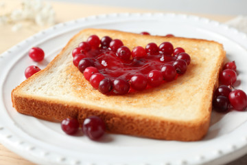 Delicious toast with sweet jam on plate