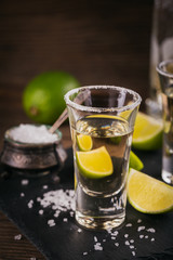 Tequila shot with lime and sea salt