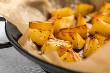 Delicious oven baked potatoes, closeup