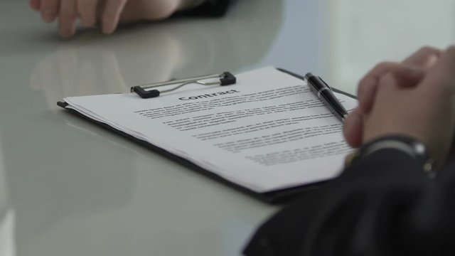 Financial director offering money in exchange for signing contract, corruption
