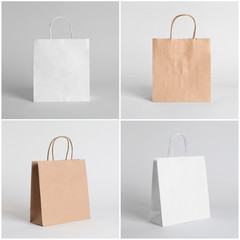 Set of blank shopping bags on light background. Mockup for design