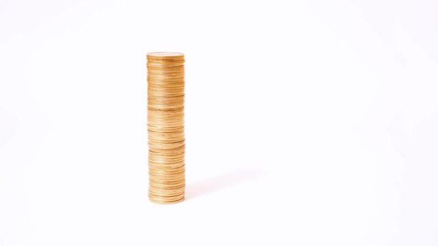 Time lapse of raising and decreasing stack of coins against white background