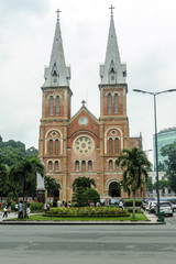 Fototapeta na wymiar front of the colonial catholic cathedral in city Ho Chi Minh, Vietnam.