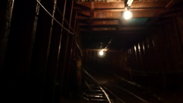 Riding in a Mine Cart Down into a Coal Mine