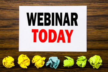 Naklejka premium Hand writing text caption inspiration showing Webinar Today. Concept for Online Education Event Written on sticky note , with sticky, one folded paper alone for difference or collaboration