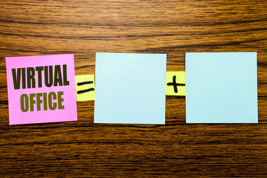 Writing text showing Virtual Office. Business concept for Online Way Of Working written on sticky note paper on wooden background. Equation mathematical with plus sign for your space