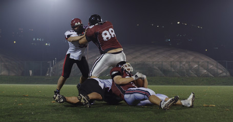 American football players in action