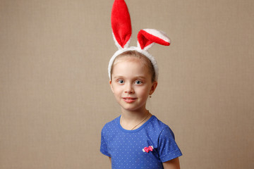 Happy easter. Child girl with bunny ears.