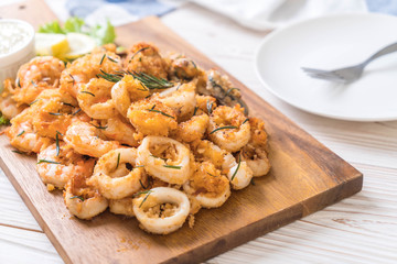 fried seafood (squids, shrimps, mussels) with sauce