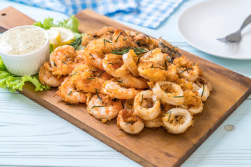 fried seafood (squids, shrimps, mussels) with sauce