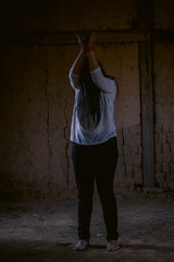 Stop violence,Depressive woman incidental rope in old disturbed room