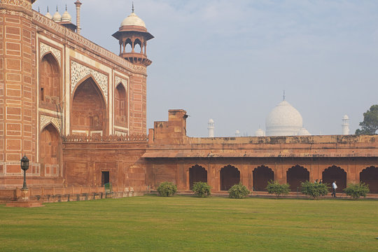 Taj Mahal seen over the fence in Agra India 