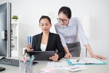 two beautiful girls business lady working together