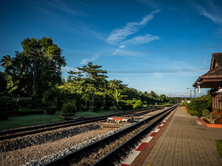 countryside train station with blue sky