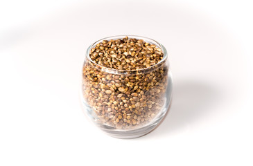 Hemp seeds in a small glass