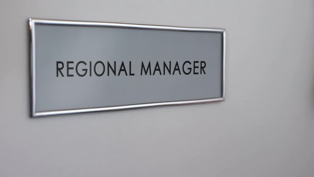 Regional manager office door, hand knocking closeup, business department growth