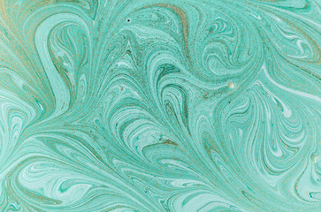 Marble abstract acrylic background. Nature green marbling artwork texture. Golden glitter.