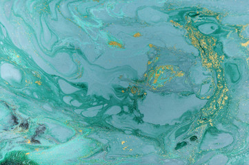 Fototapeta na wymiar Marble abstract acrylic background. Nature blue marbling artwork texture. Golden glitter.