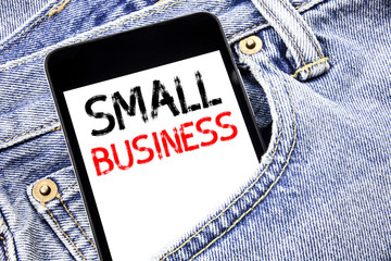 Handwriting Announcement text showing Small Business. Business concept for Strategy Management Written phone mobile phone, cellphone placed in the man front jeans pocket.