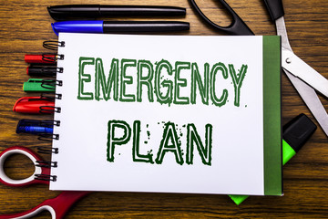 Conceptual hand writing text Emergency Plan.  Concept for Disaster Protection Written on notebook,...