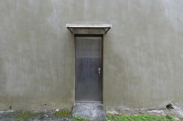 sidewalk by street wall & door