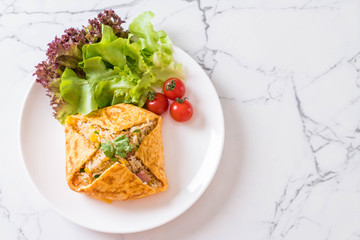 Flavored Fried Rice in an Omelet Wrapping