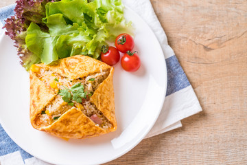 Flavored Fried Rice in an Omelet Wrapping