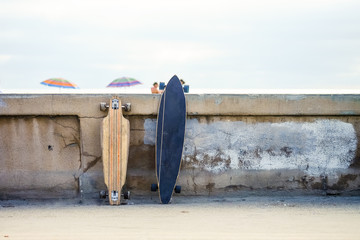 skateboards leaning on the curb © jpbarcelos