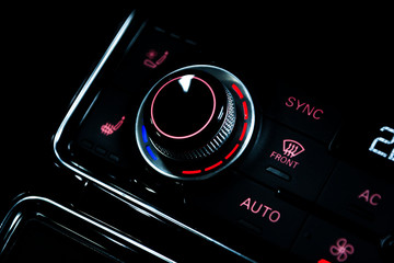 Close up shot of luxury car audio controls