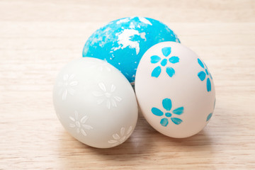 handmade easter eggs a isolated on wooden background.