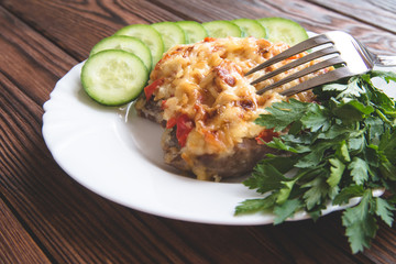 Pork chop with cheese and red pepper 