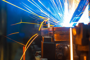 Welding robots movement in a car factory
