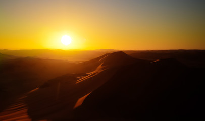 Fototapeta na wymiar Sunrise view to Tin Merzouga dune, Tassili nAjjer national park, Algeria