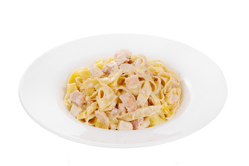 Pasta, noodles with chicken, decorated with cheese. Isolated white Side view Serving a meal in a cafe, restaurant.