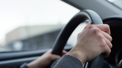 Closeup Of Woman's Hands On Steering Wheel, As She Drives Downtown - Shot On Red Scarlet-W Dragon In 4K/ Slow Motion