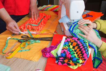 Close-up of woman's hand stitching quilting. Tailor Woman working in his tailor shop, Tailoring. tailoring concept