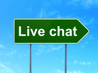 Web design concept: Live Chat on green road highway sign, clear blue sky background, 3D rendering