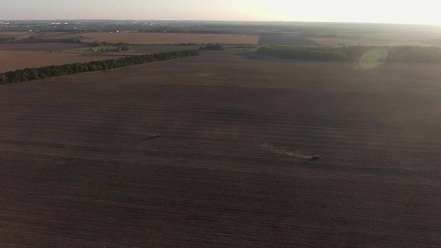 Video Footage aerial view combines harvesting top view
