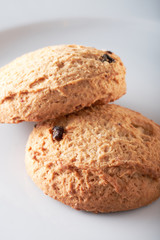 Biscuits with sugar on white background.