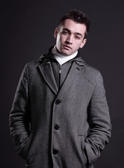 Obraz premium cool real young man in coat